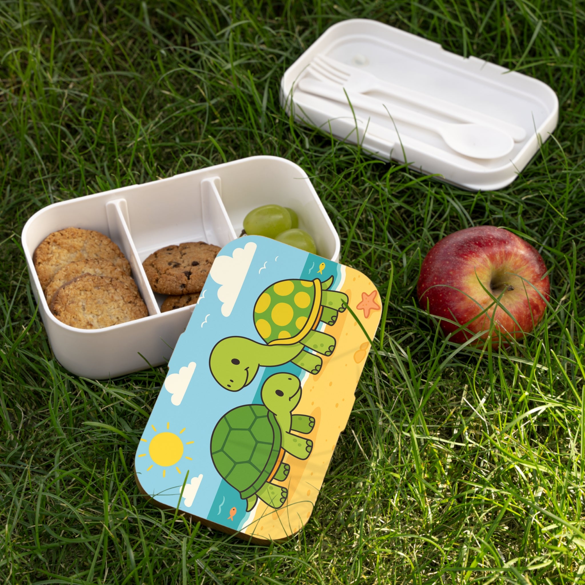 Fröhliche Schildkröten am Strand